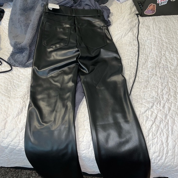 Black faux leather pants. Slight flare. Size S. - Picture 3 of 4